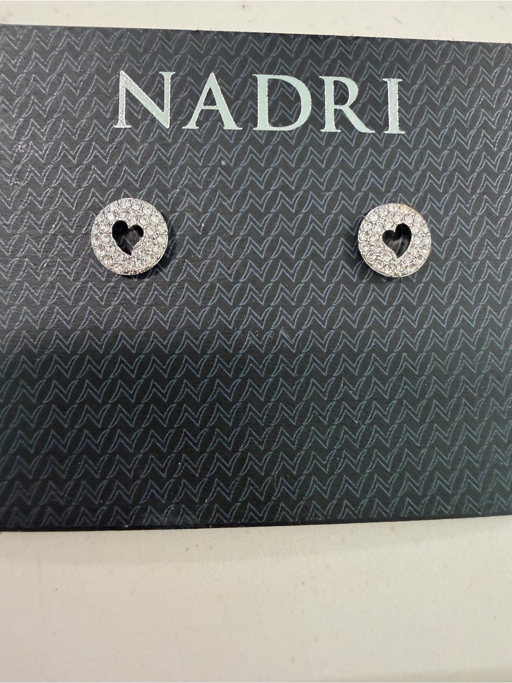 Nadri Silver Pavé Circle Stud Earrings with Heart Cutout